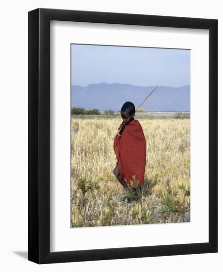 Young Boy of the Datoga Tribe Crosses the Plains East of Lake Manyara in Northern Tanzania-Nigel Pavitt-Framed Photographic Print