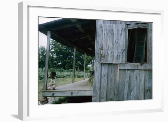 Young Boy on the Porch and a Second Boy Looking Out of Window, on Edisto Island, South Carolina-Walter Sanders-Framed Photographic Print