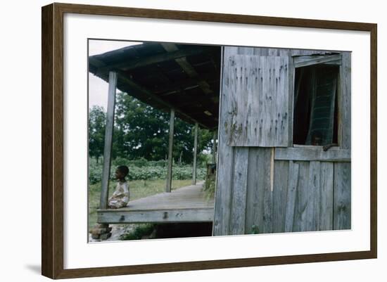 Young Boy on the Porch and a Second Boy Looking Out of Window, on Edisto Island, South Carolina-Walter Sanders-Framed Photographic Print