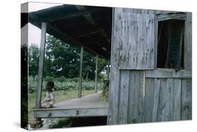 Young Boy on the Porch and a Second Boy Looking Out of Window, on Edisto Island, South Carolina-Walter Sanders-Stretched Canvas