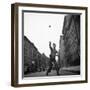 Young Boy Pitching Ball on a City Street-Cornell Capa-Framed Photographic Print