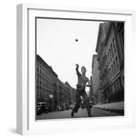 Young Boy Pitching Ball on a City Street-Cornell Capa-Framed Photographic Print