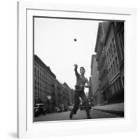 Young Boy Pitching Ball on a City Street-Cornell Capa-Framed Photographic Print