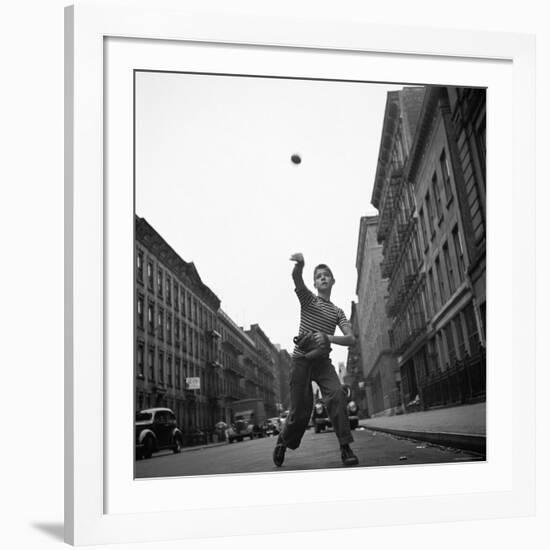 Young Boy Pitching Ball on a City Street-Cornell Capa-Framed Photographic Print