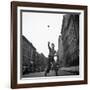 Young Boy Pitching Ball on a City Street-Cornell Capa-Framed Photographic Print