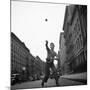 Young Boy Pitching Ball on a City Street-Cornell Capa-Mounted Photographic Print