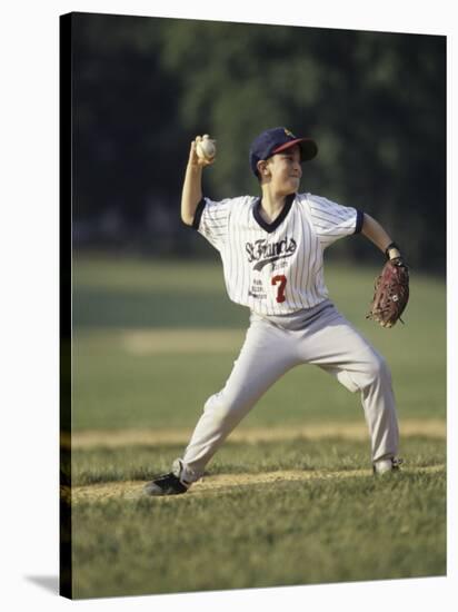 Young Boy Pitching During a Little League Baseball Games-null-Stretched Canvas