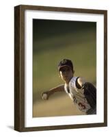 Young Boy Pitching During a Little League Baseball Games-null-Framed Photographic Print