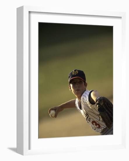 Young Boy Pitching During a Little League Baseball Games-null-Framed Photographic Print