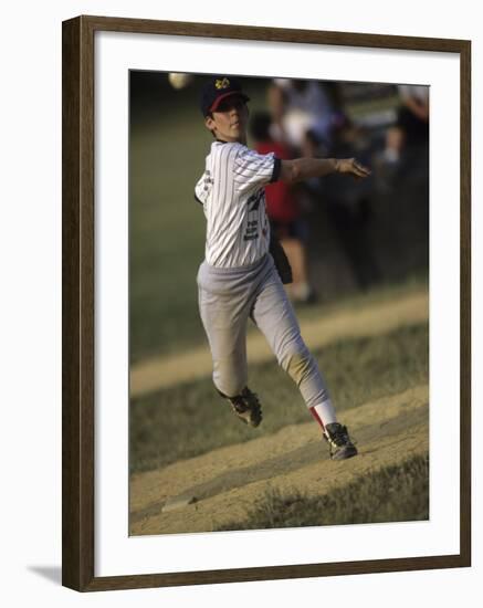 Young Boy Pitching During a Little League Baseball Games-null-Framed Photographic Print