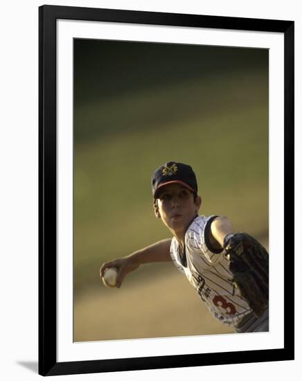 Young Boy Pitching During a Little League Baseball Games-null-Framed Photographic Print