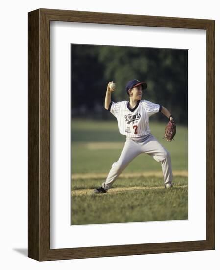 Young Boy Pitching During a Little League Baseball Games-null-Framed Photographic Print