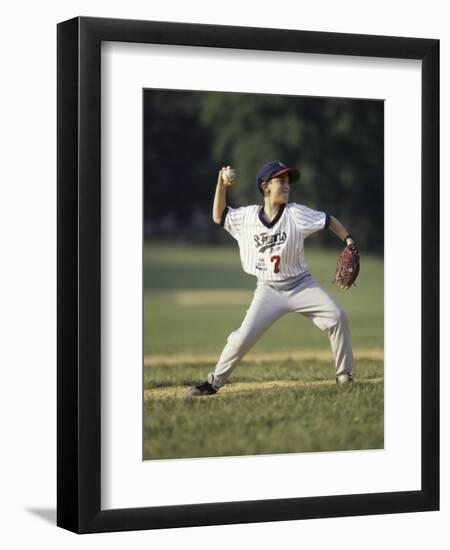 Young Boy Pitching During a Little League Baseball Games-null-Framed Photographic Print