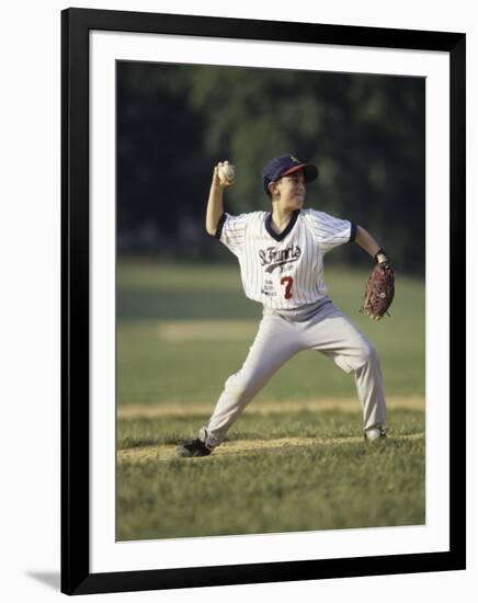 Young Boy Pitching During a Little League Baseball Games-null-Framed Photographic Print