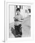 Young Boy Plays Cowboy in a California Alley, Ca. 1952-null-Framed Photographic Print