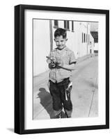 Young Boy Plays Cowboy in a California Alley, Ca. 1952-null-Framed Photographic Print