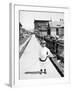 Young Boy Plays on a New Colorado Sidewalk, Ca. 1910-null-Framed Photographic Print