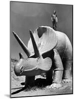 Young Boy Standing Atop Large Statue of Dinosaur in "Dinosaur Park" Tourist Attraction-Alfred Eisenstaedt-Mounted Photographic Print