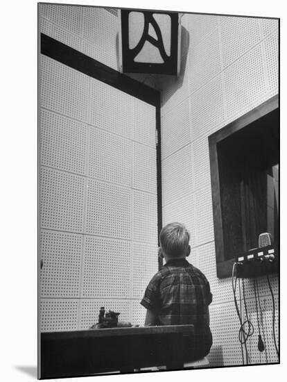 Young Boy Starring at the Loudspeaker Trying to Hear During a Medical Deafness Test-John Dominis-Mounted Photographic Print