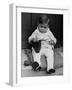 Young Boy Trying to Use Knitting Needles During Drive to Provide Woolen Goods for Servicemen-null-Framed Photographic Print