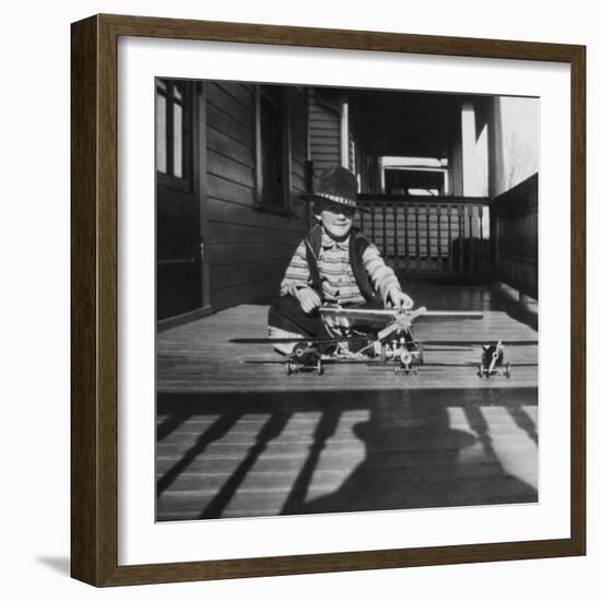 Young Boy with His Model Airplanes, Ca. 1932.-Kirn Vintage Stock-Framed Photographic Print