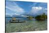 Young Boys Fishing in the Marovo Lagoon before Dramatic Clouds, Solomon Islands, South Pacific-Michael Runkel-Stretched Canvas