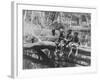 Young Boys Sitting on a Fallen Tree Spanning Small Waterhole While One Uses Homemade Fishing Pole-null-Framed Photographic Print