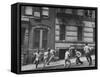 Young Boys with Sticks, Running Around While Playing a Street Game in Spanish Harlem-Ralph Morse-Framed Stretched Canvas