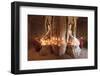 Young Buddhist monks pray in front of a statue of Buddha in a temple in Bagan, Myanmar-Tim Mannakee-Framed Photographic Print