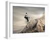 Young Businessman Pedaling a Bicycle on the Rocks-olly2-Framed Photographic Print