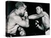 Young Cassius Clay Scores with a Left Against the Veteran Archie Moore in the First Round of the?-American Photographer-Stretched Canvas