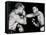 Young Cassius Clay Scores with a Left Against the Veteran Archie Moore in the First Round of the?-American Photographer-Framed Stretched Canvas