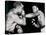 Young Cassius Clay Scores with a Left Against the Veteran Archie Moore in the First Round of the?-American Photographer-Stretched Canvas