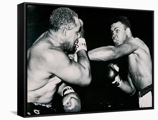 Young Cassius Clay Scores with a Left Against the Veteran Archie Moore in the First Round of the?-American Photographer-Framed Stretched Canvas