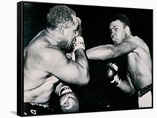 Young Cassius Clay Scores with a Left Against the Veteran Archie Moore in the First Round of the?-American Photographer-Framed Stretched Canvas