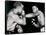 Young Cassius Clay Scores with a Left Against the Veteran Archie Moore in the First Round of the?-American Photographer-Framed Stretched Canvas