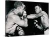 Young Cassius Clay Scores with a Left Against the Veteran Archie Moore in the First Round of the?-American Photographer-Stretched Canvas