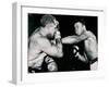 Young Cassius Clay Scores with a Left Against the Veteran Archie Moore in the First Round of the?-American Photographer-Framed Premium Photographic Print