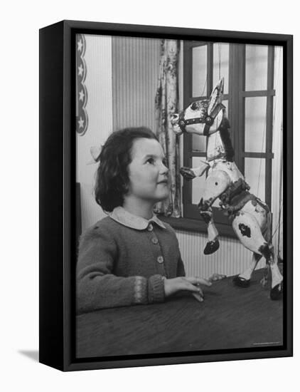 Young Child Starring at Marionette Muffin the Mule-William Sumits-Framed Stretched Canvas