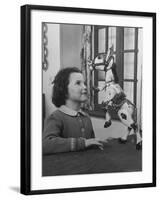 Young Child Starring at Marionette Muffin the Mule-William Sumits-Framed Photographic Print