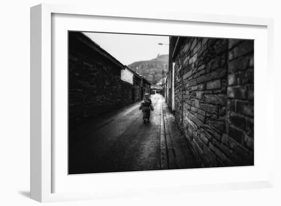 Young Child Walking Down Street-Clive Nolan-Framed Photographic Print