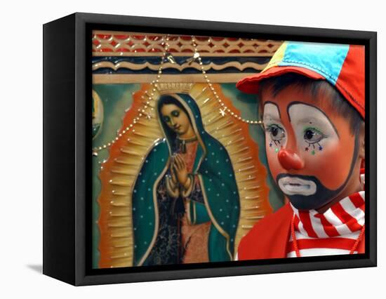 Young Clown, "Bolillito," Stands Next to an Image of the Virgin of Guadalupe in Mexico City-null-Framed Stretched Canvas