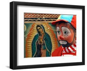 Young Clown, "Bolillito," Stands Next to an Image of the Virgin of Guadalupe in Mexico City-null-Framed Photographic Print