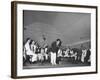 Young Conductor Lorin Maazel Taking a Bow at a Concert by the Robin Hood Dell Orchestra-Nina Leen-Framed Premium Photographic Print