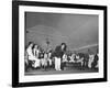 Young Conductor Lorin Maazel Taking a Bow at a Concert by the Robin Hood Dell Orchestra-Nina Leen-Framed Premium Photographic Print