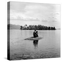 Young Couple Embracing on Small Rock Protruding from the Waters of Lake George-Nina Leen-Stretched Canvas