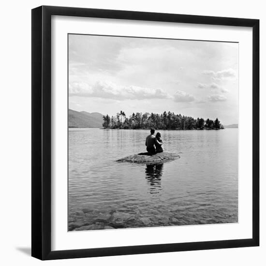 Young Couple Embracing on Small Rock Protruding from the Waters of Lake George-Nina Leen-Framed Photographic Print