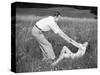 Young Couple Frolicking in Grass-Philip Gendreau-Stretched Canvas