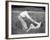 Young Couple Frolicking in Grass-Philip Gendreau-Framed Photographic Print