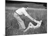 Young Couple Frolicking in Grass-Philip Gendreau-Mounted Photographic Print